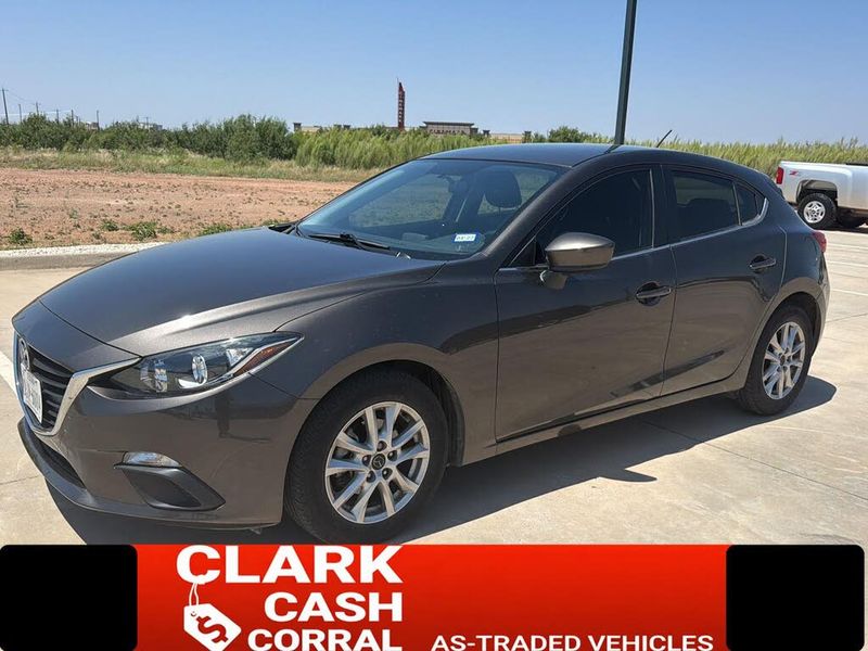 2014 Mazda MAZDA3 — a typically priced live listing