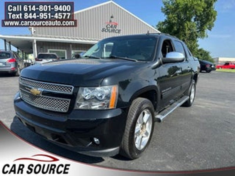 2013 Chevrolet Avalanche — a typically priced live listing