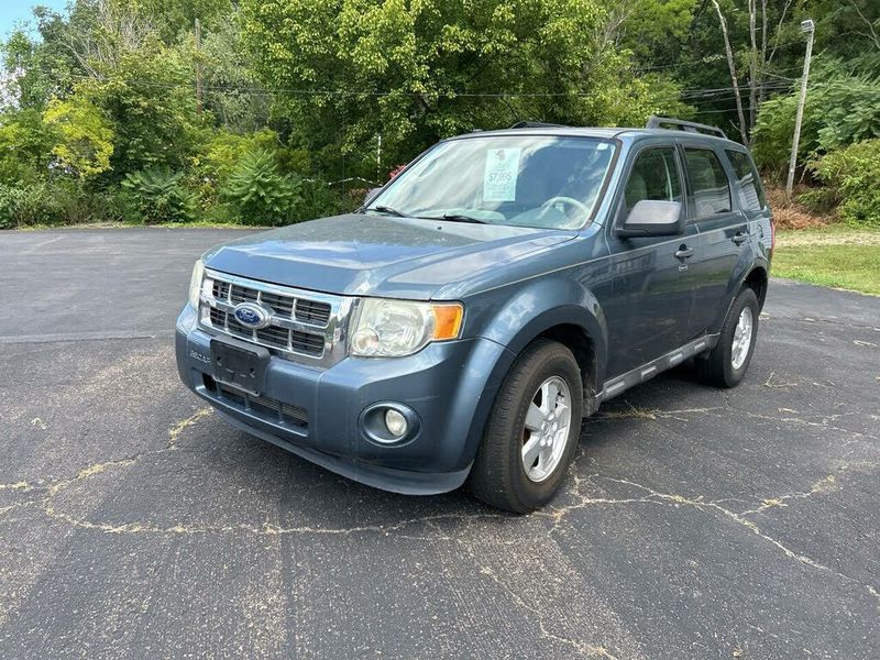 2011 Ford Escape — a typically priced live listing