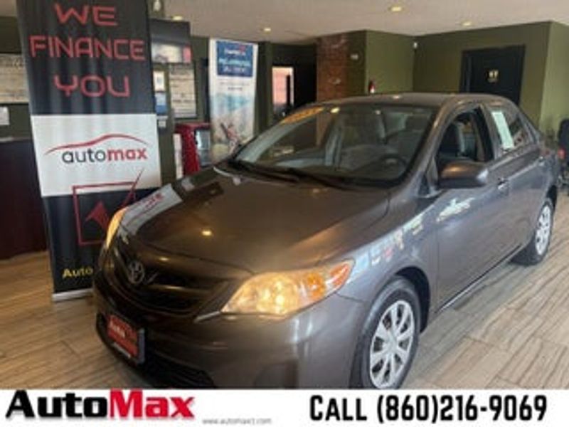 2011 Toyota Corolla — a typically priced live listing