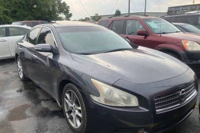 2011 Nissan Maxima — a typically priced live listing