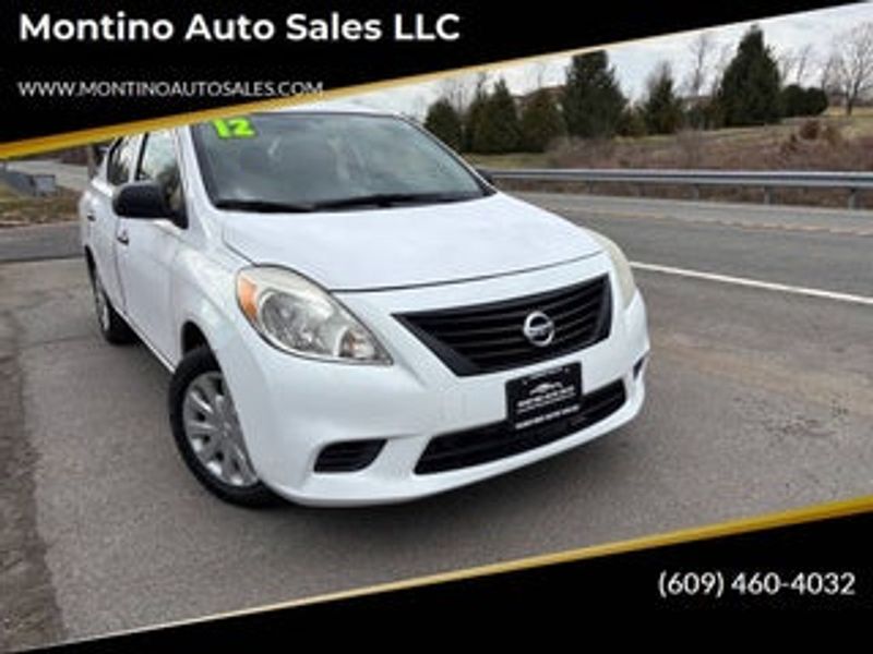 2010 Nissan Versa — a typically priced live listing