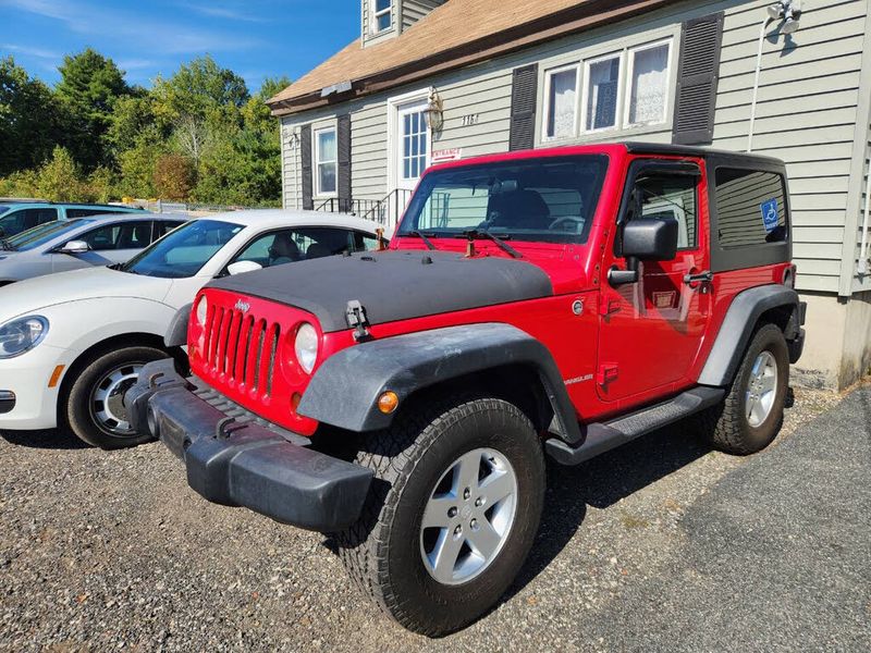 2011 Jeep Wrangler — a typically priced live listing