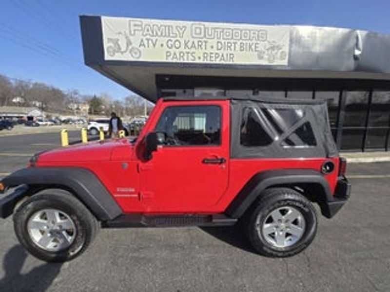 2009 Jeep Wrangler — a typically priced live listing