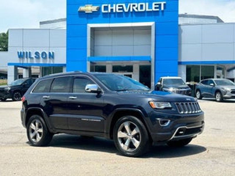 2013 Jeep Grand Cherokee — a typically priced live listing