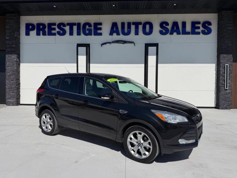 2013 Ford Escape — a typically priced live listing