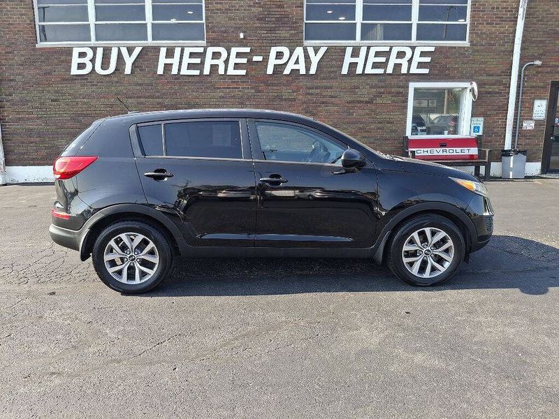 2014 Kia Sportage — a typically priced live listing