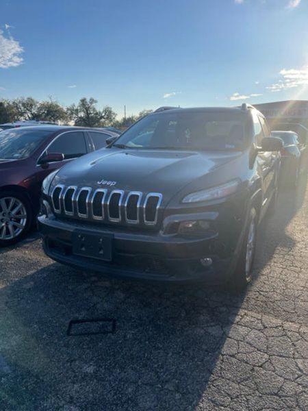 2015 Jeep Cherokee — a typically priced live listing