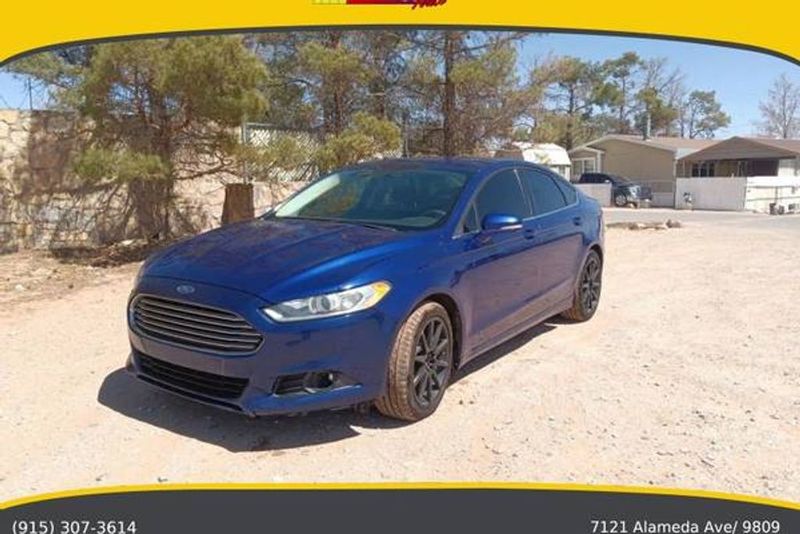 2014 Ford Fusion — a typically priced live listing