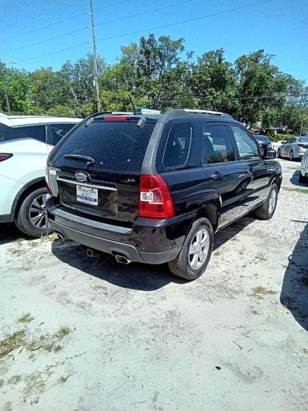 2009 Kia Sportage — a typically priced live listing