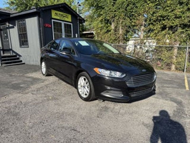 2013 Ford Fusion — a typically priced live listing