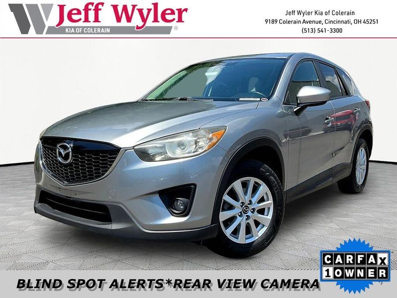 2014 Mazda CX-5 — a typically priced live listing