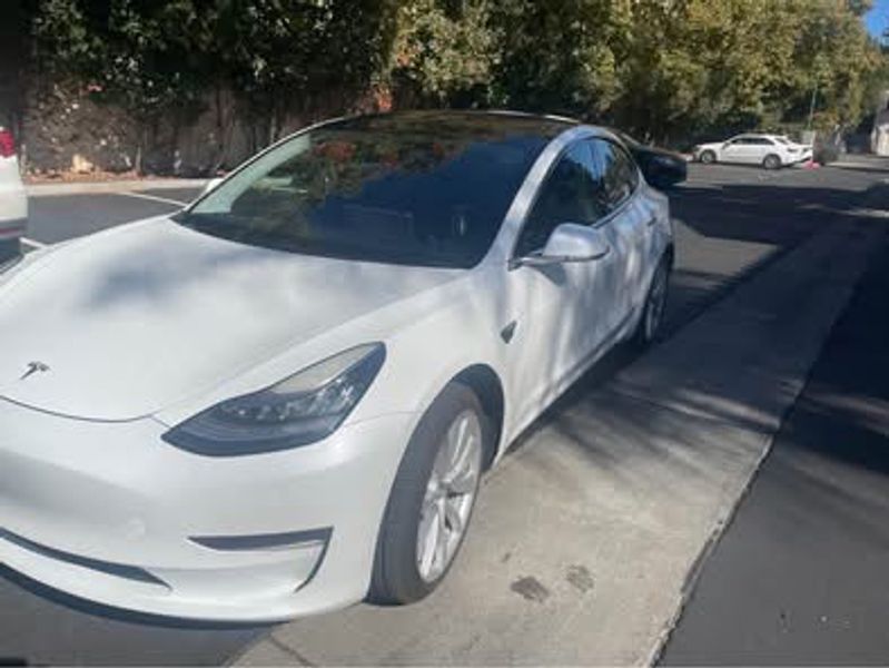 2017 Tesla Model 3 — a typically priced live listing