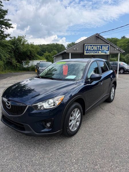 2014 Mazda CX-5 — a typically priced live listing