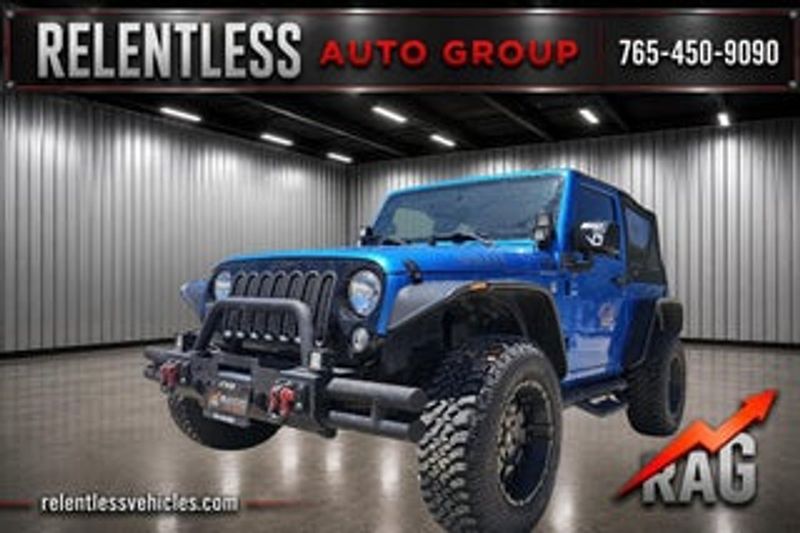 2013 Jeep Wrangler — a typically priced live listing