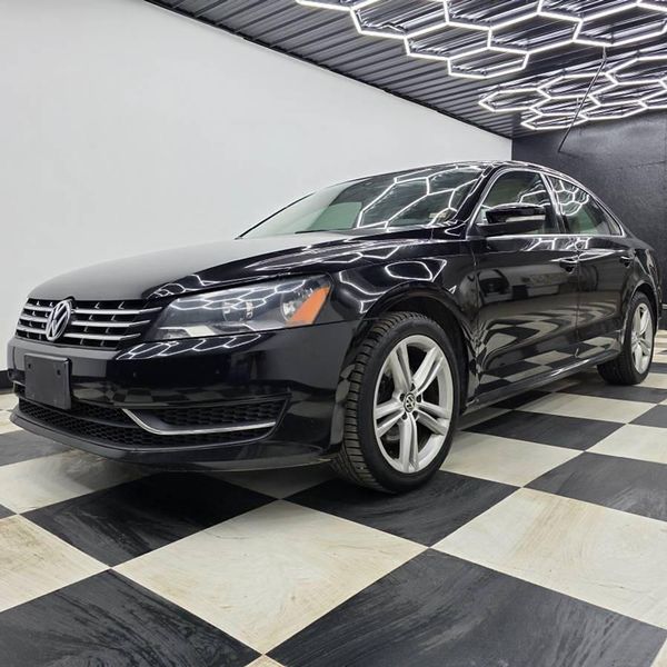 2014 Volkswagen Passat — a typically priced live listing
