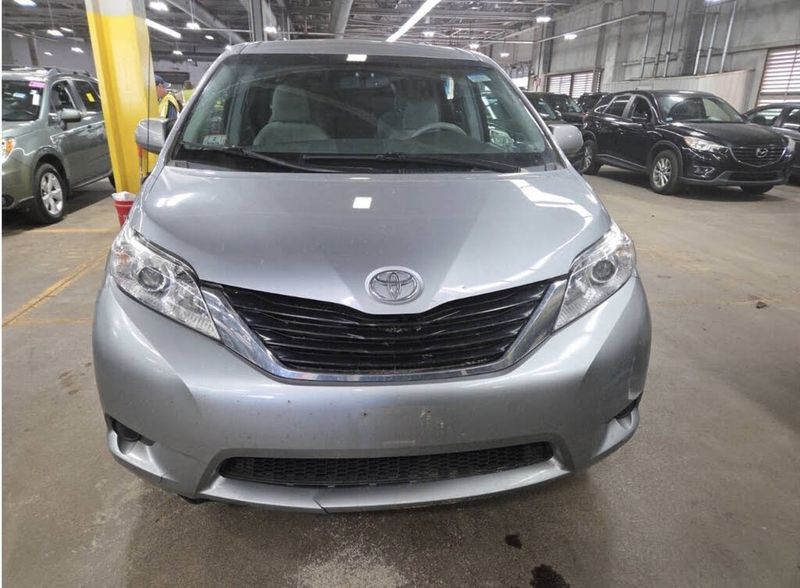 2011 Toyota Sienna — a typically priced live listing