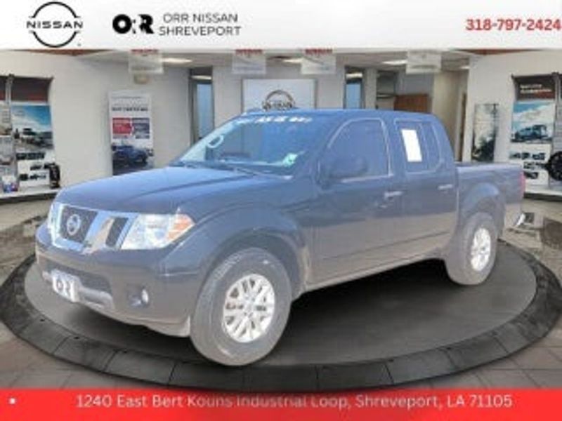 2016 Nissan Frontier — a typically priced live listing