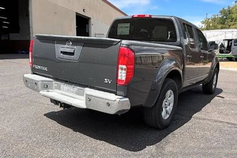2013 Nissan Frontier — a typically priced live listing