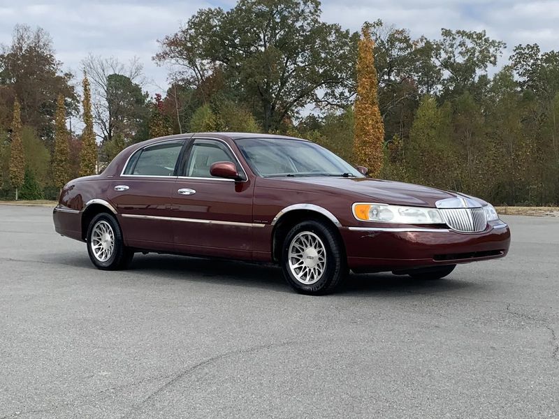 2002 Lincoln Town Car — a typically priced live listing