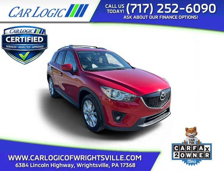 2015 Mazda CX-5 — a typically priced live listing