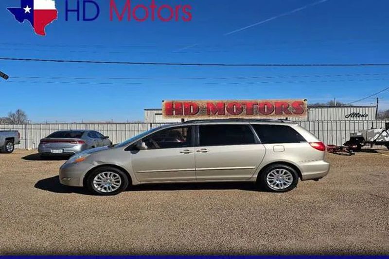 2009 Toyota Sienna — a typically priced live listing