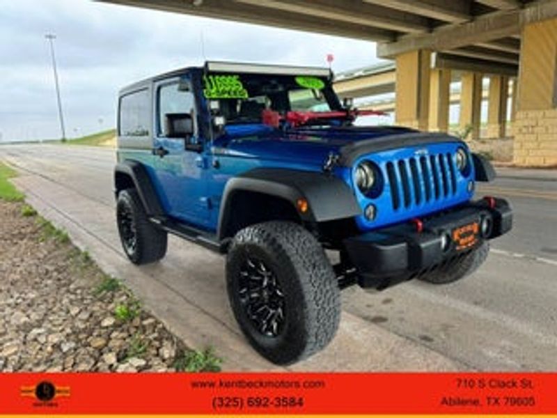 2015 Jeep Wrangler — a typically priced live listing