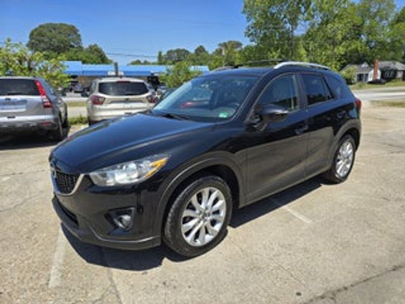 2015 Mazda CX-5 — a typically priced live listing