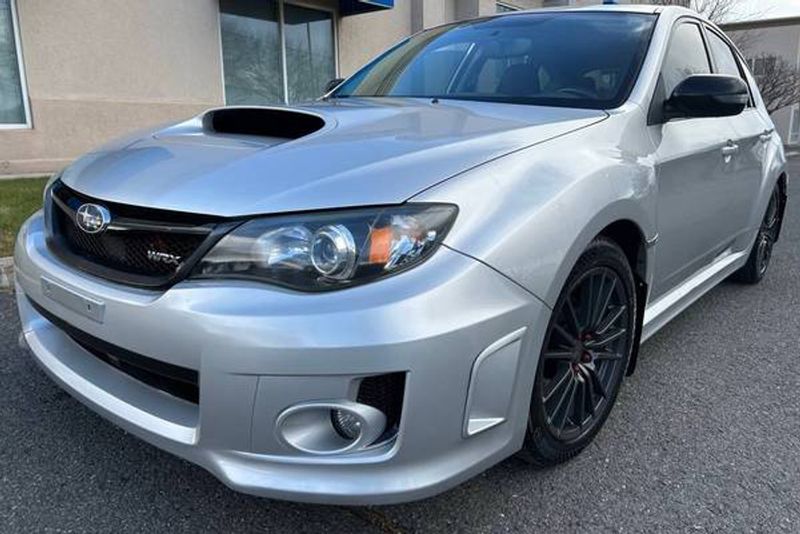 2011 Subaru Impreza — a typically priced live listing