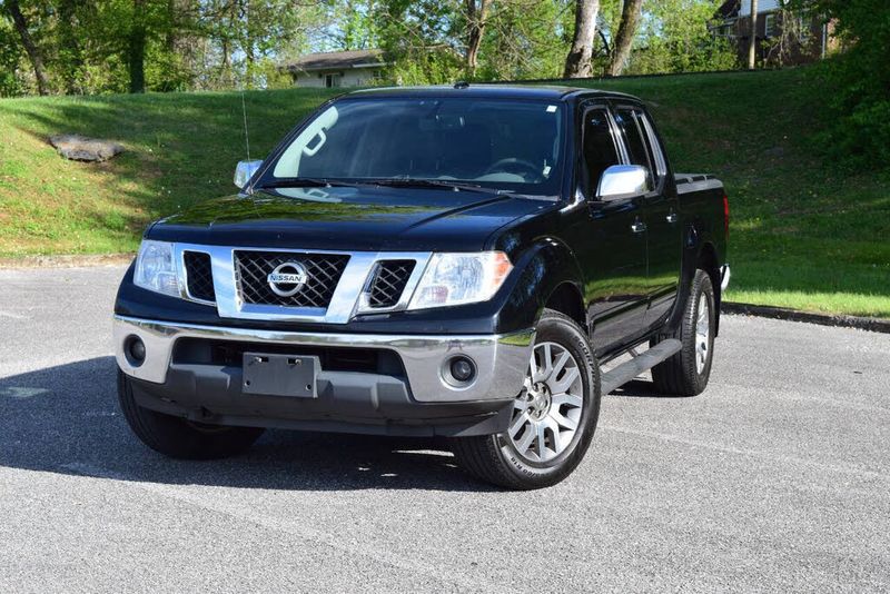 2013 Nissan Frontier — a typically priced live listing