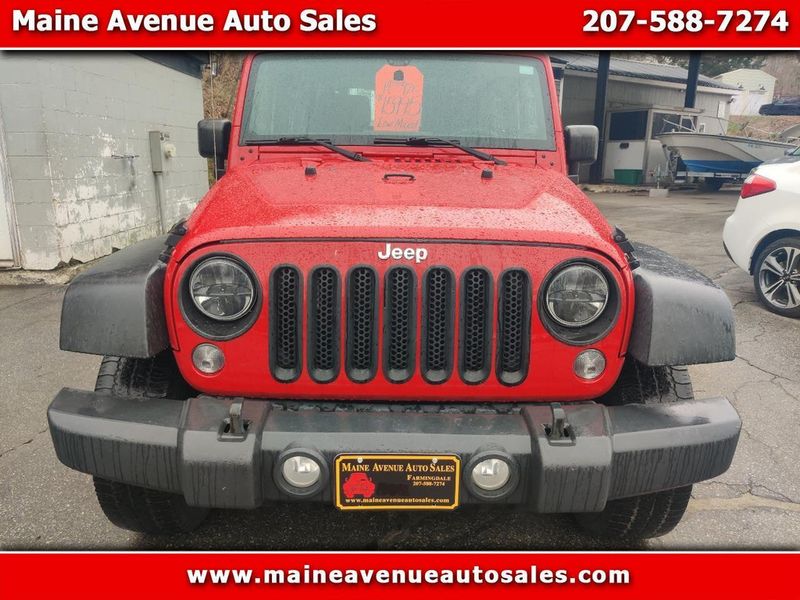 2014 Jeep Wrangler — a typically priced live listing