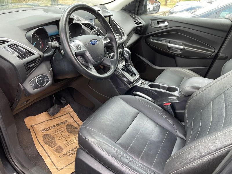 2014 Ford Escape — a typically priced live listing