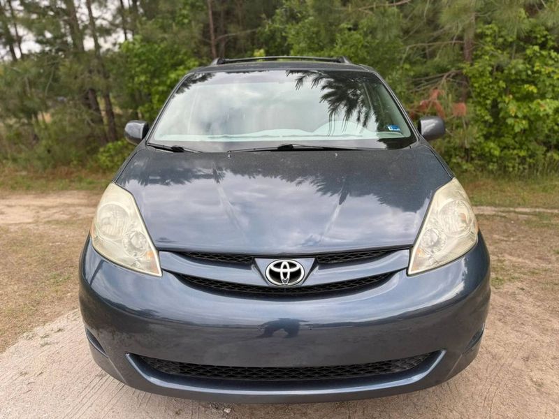 2008 Toyota Sienna — a typically priced live listing