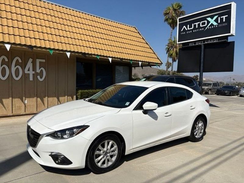 2015 Mazda MAZDA3 — a typically priced live listing