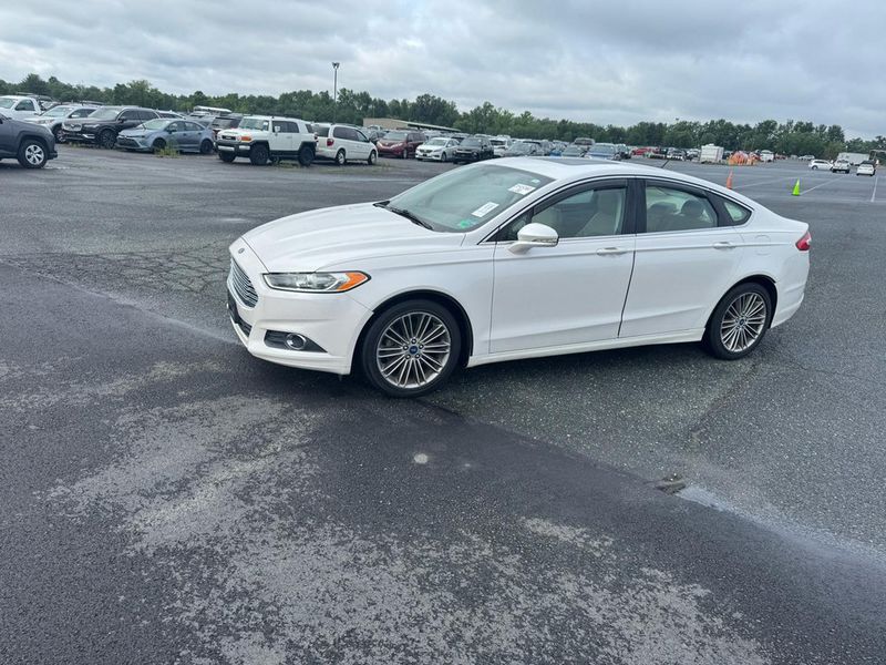 2014 Ford Fusion — a typically priced live listing