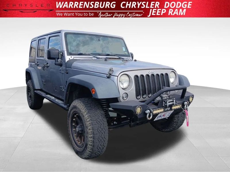 2015 Jeep Wrangler — a typically priced live listing
