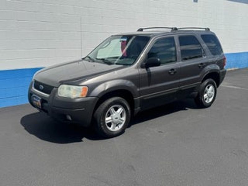 2003 Ford Escape — a typically priced live listing