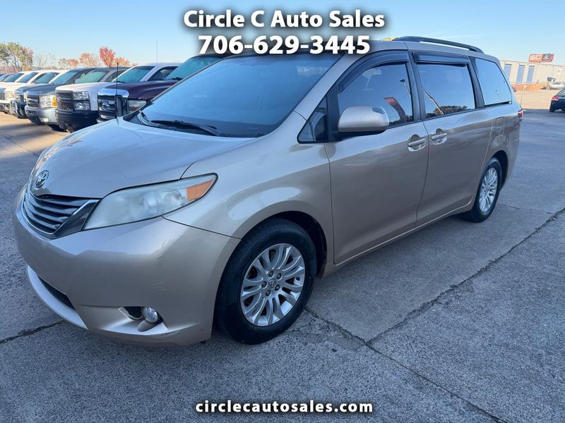 2013 Toyota Sienna — a typically priced live listing