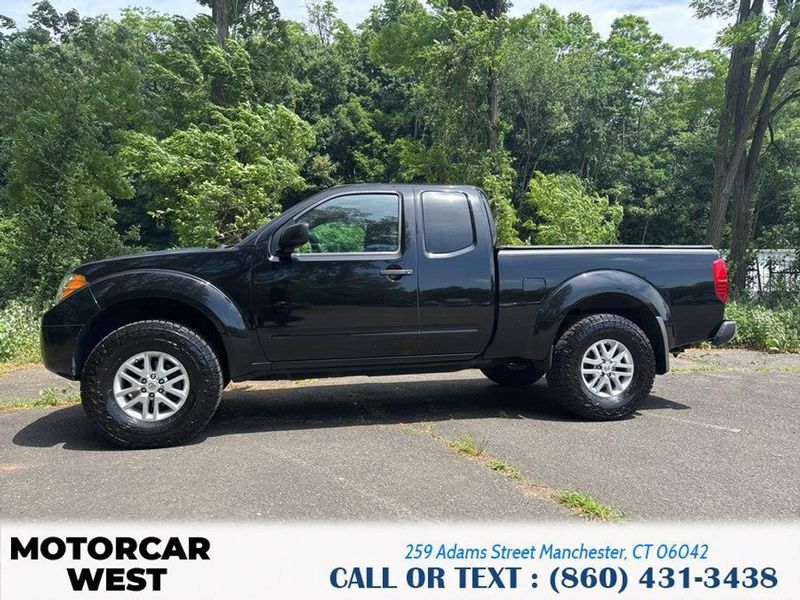 2014 Nissan Frontier — a typically priced live listing