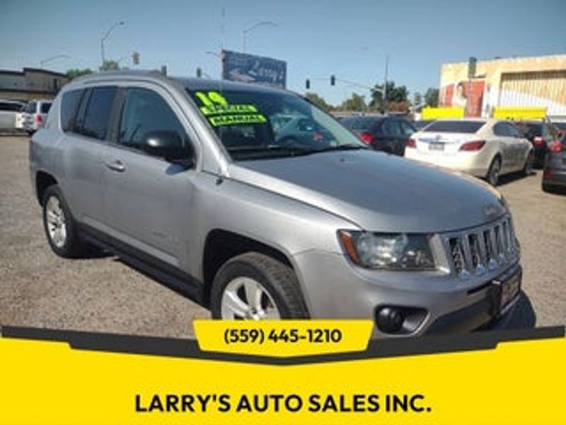 2014 Jeep Compass — a typically priced live listing