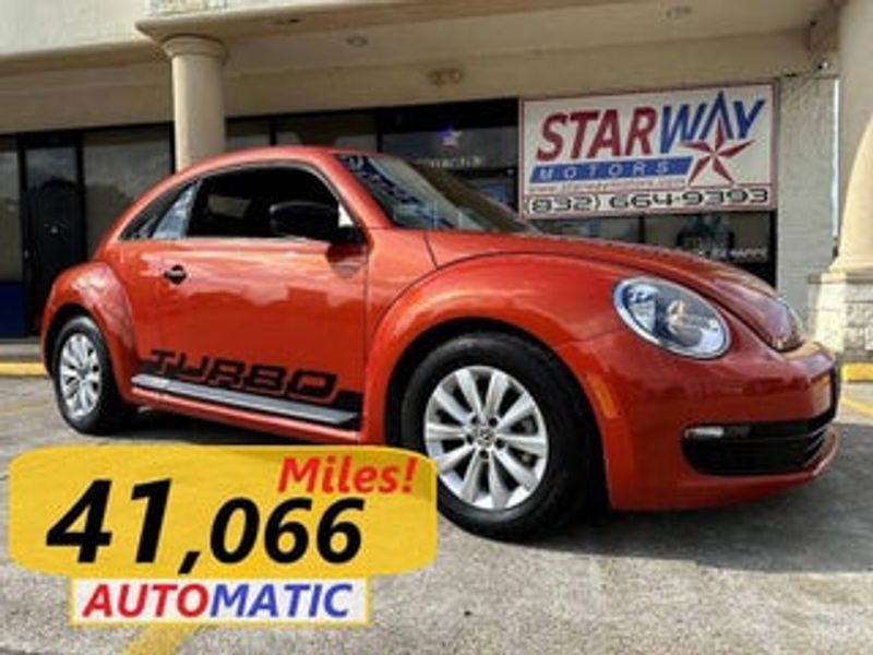 2016 Volkswagen Beetle — a typically priced live listing