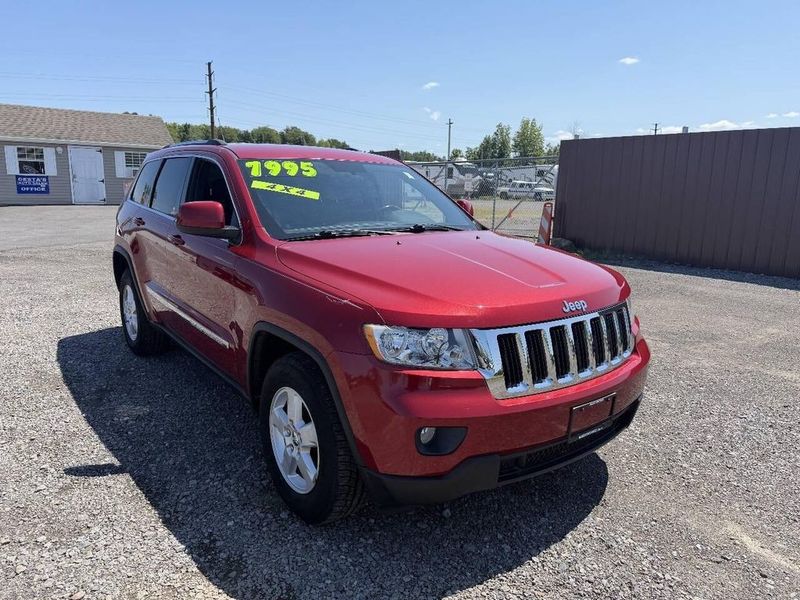 2011 Jeep Grand Cherokee — a typically priced live listing