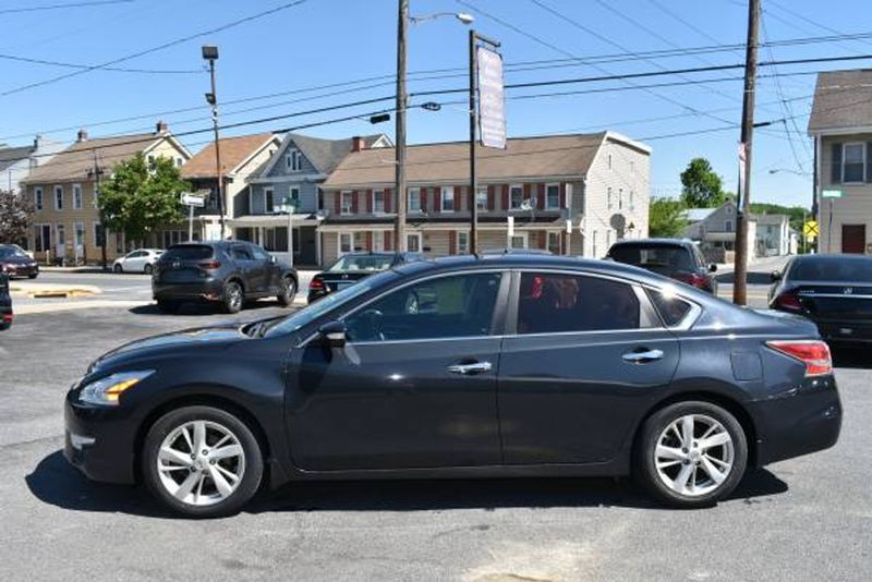 2014 Nissan Altima — a typically priced live listing