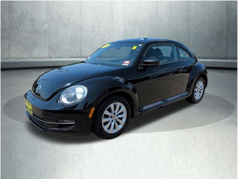 2013 Volkswagen Beetle — a typically priced live listing