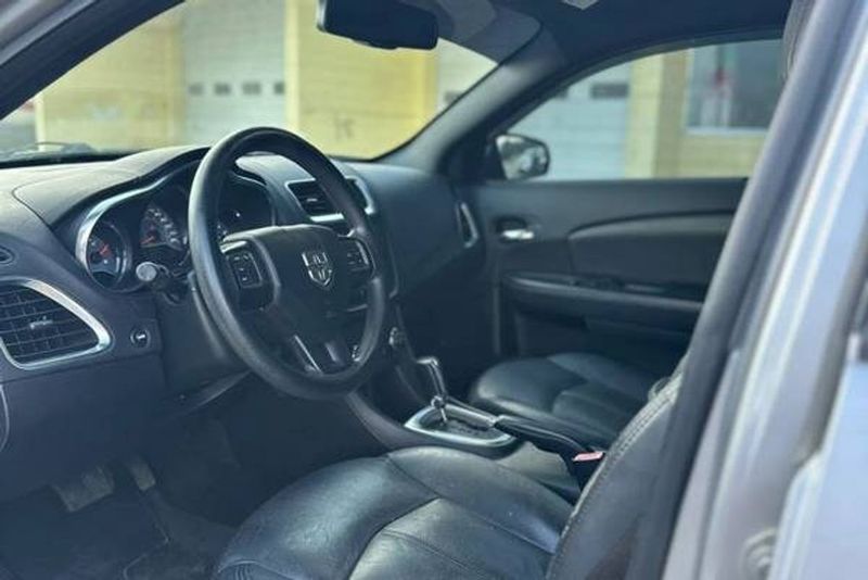 2014 Dodge Avenger — a typically priced live listing