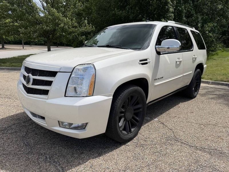 2012 Cadillac Escalade — a typically priced live listing