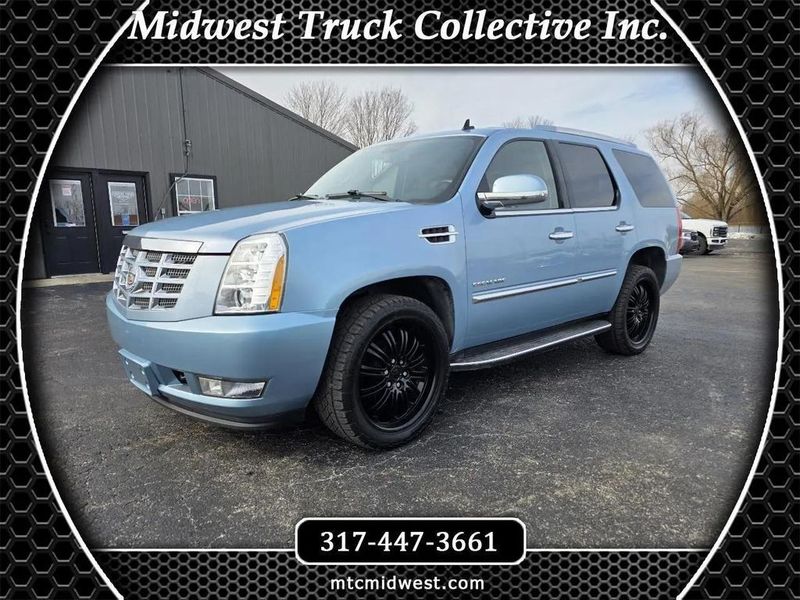 2011 Cadillac Escalade — a typically priced live listing