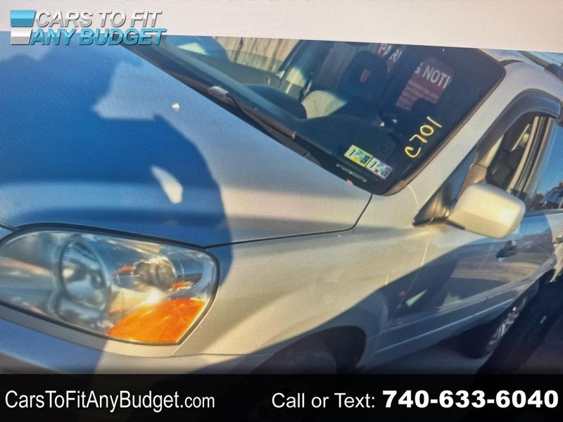 2003 Honda Pilot — a typically priced live listing