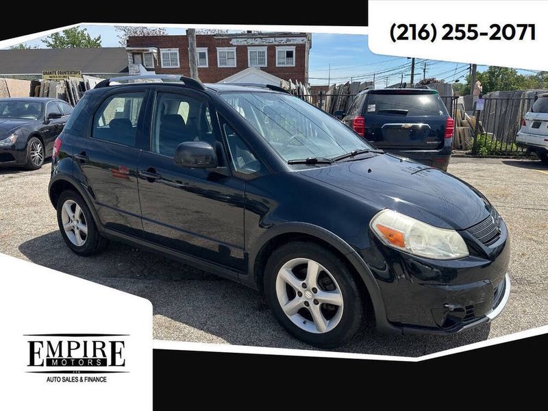 2007 Suzuki SX4 — a typically priced live listing