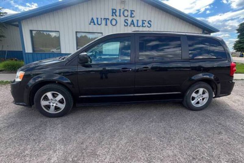 2011 Dodge Grand Caravan — a typically priced live listing
